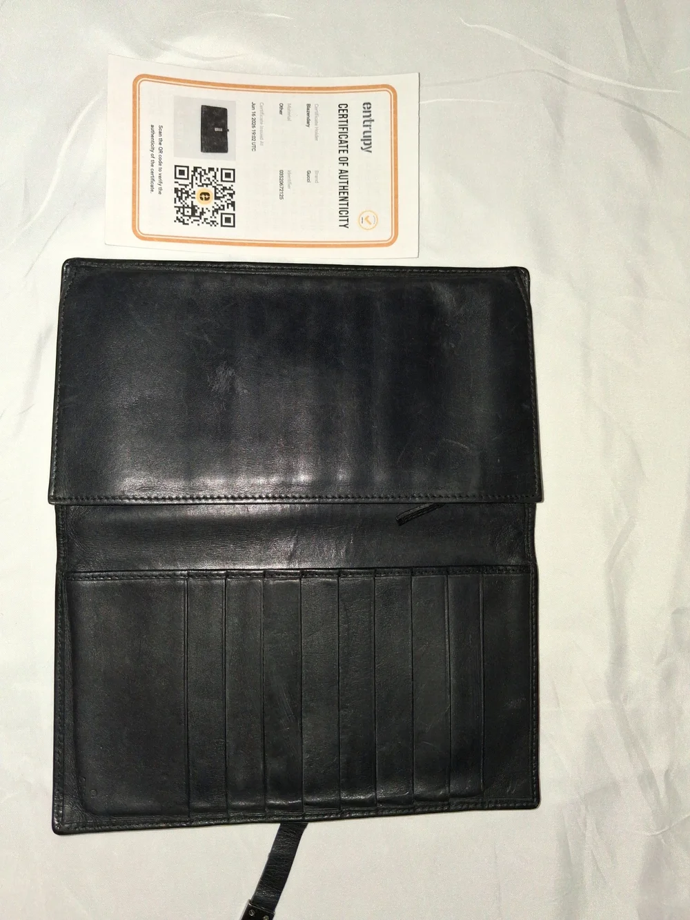 Gucci Black Wallet w/ Metal Logo Tab, Strap Closure, Card Slots, Entrupy COA